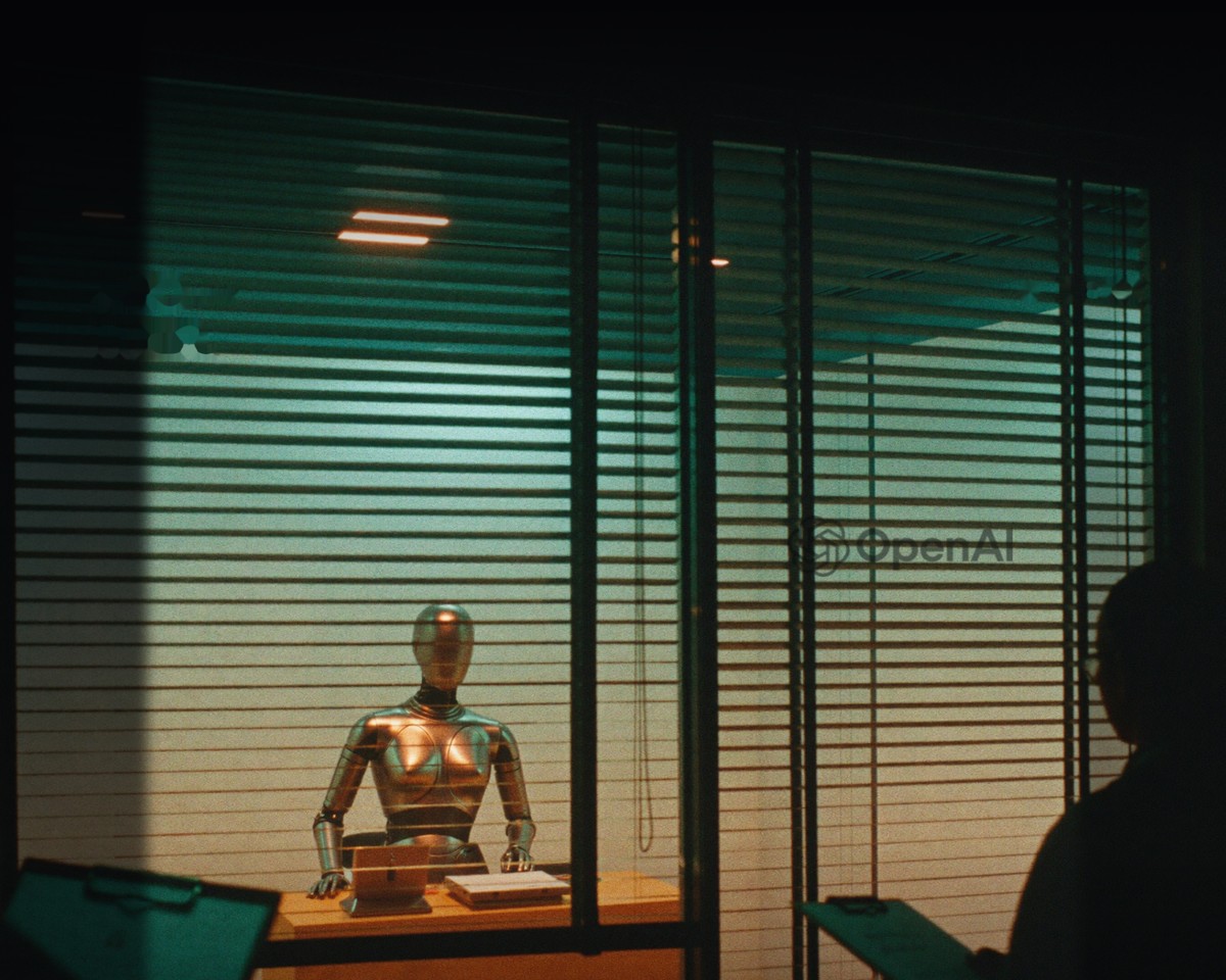A calm android wired to a lie detector in a dim room